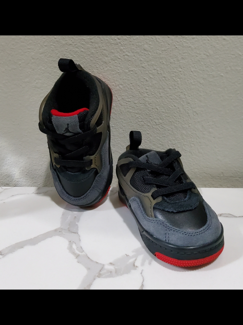 Jordan 4 Kids Black and Gray Sneakers with Red Accent Sice 5C